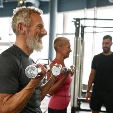 old man lift weights